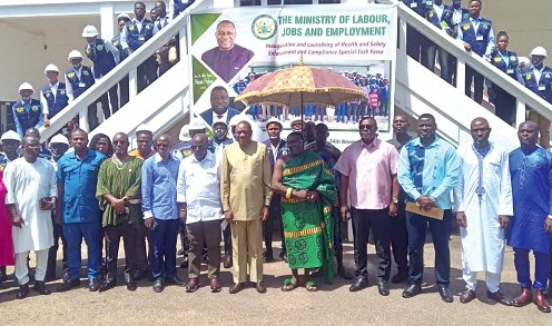 Dr Abdul Rashid Hassan Pelpuo (middle), Minister of Labour, Jobs and Employment, together with other dignitaries and members of the task force