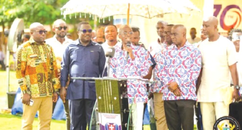Johnson Asiedu Nketiah with microphone addressing the gathering