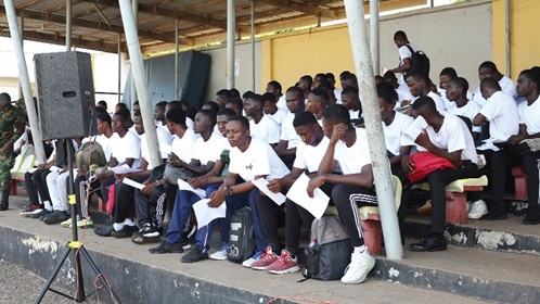Some potential recruits patiently seated waiting for their turn at the El-Wak Stadium. Pictures: BENEDICT OBUOBI