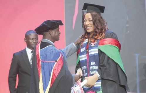 Dr Itoro Bankole (right), receiving the Best International Student Award from Prof. Raymond Tetteh, Dean, School of Pharmacy. Picture: ESTHER ADJORKOR ADJEI