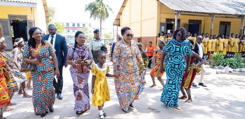 Lordina Mahama (2nd from right), First Lady, with some members of her entourage, arriving at the school