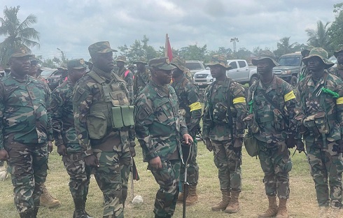 Major General Lawrence Kwaku Gbetanu (arrowed), the Chief of the Army Staff, inspecting the parade