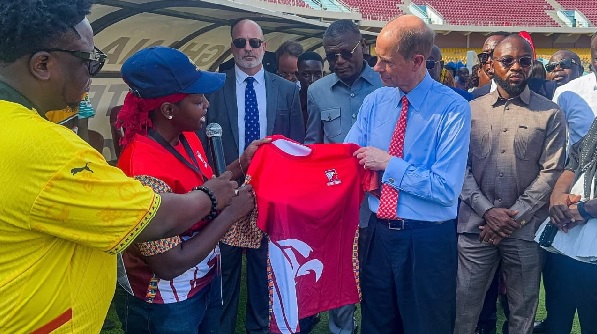 Rafatu Inusah, GRFU President presenting a shirt to  Prince Edward, The Duke of Edinburgh at the event