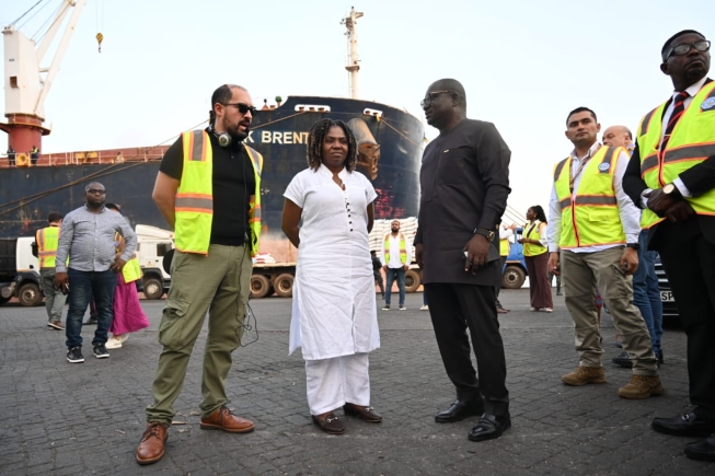 Francia Elena Márquez Mina,(middle) Vice President of Colombia interacting with Mr.  Tebon Zumah,(right) Director of the Port of Tema during the tour.