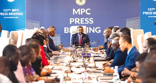 Dr Johnson Pandit Asiama  (middle), Governor of BoG, addressing the meeting