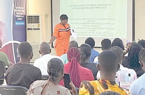 ASP Linda Boateng (standing), Kasoa Divisional DOVVSU Coordinator, engaging participants on Sexual and Gender Based Violence