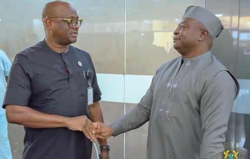 Football icon Abedi Ayew ‘Pele’ (right) exchanging pleasantries with Stan Xoese Dogbe, a Deputy Chief of Staff and committee member