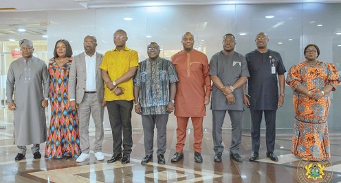 Julius Debrah (middle), Chief of Staff, with members of the Ministerial Oversight Committee after the inauguration at Jubilee House