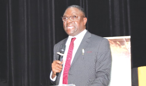 Dr Humphrey Kwesi Ayim Darke (right), outgoing President, AGI, addressing participants in the 65th National Annual General Meeting and Job Fair