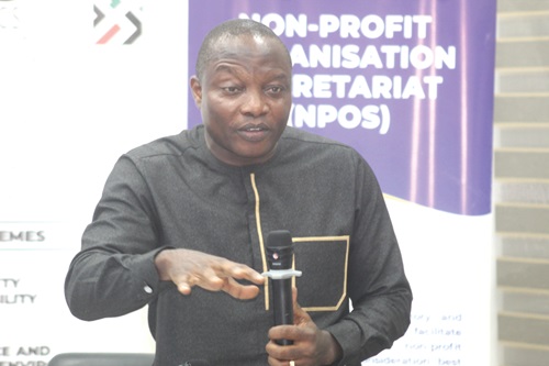 Felix Logh (inset), Head of the Non-Profit Organization Secretariat, MoGCSP, addressing participants in the meeting. Picture: ESTHER ADJORKOR ADJEI 