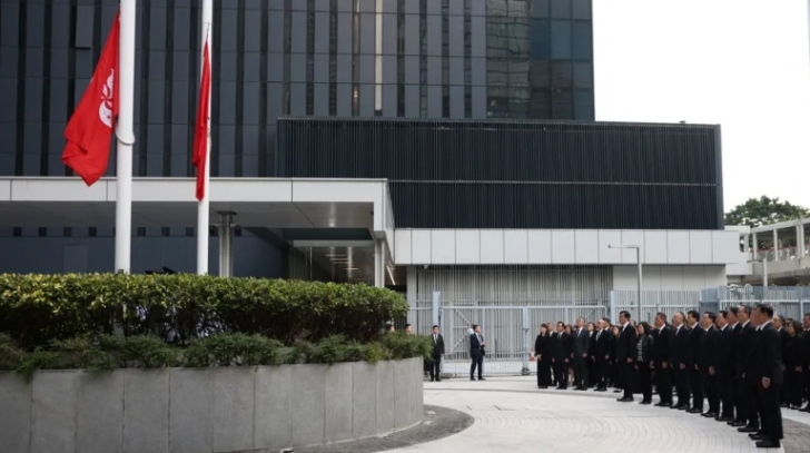 Hong Kong officials mark beginning of official mourning period with moment of silence