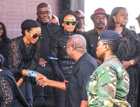 President John Dramani Mahama commiserating with Yaa Asantewaa Agyeman-Rawlings (left) during the funeral. Picture: CALEB VANDERPUYE 