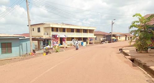 The untarred main road of the Pepease town