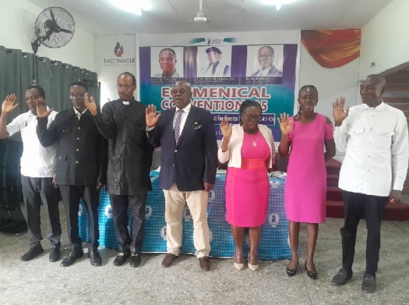 Koku Anyidoho (middle), Founder of Mills Institute with other members of the committee pledging their commitment to a successful convention