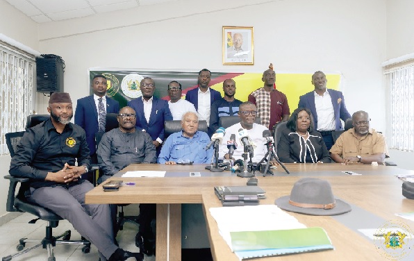 Kofi Iddie Adams (seated 3rd from right), Minister of Sports and Recreation, and Yaw Ampofo Ankrah (seated left), NSA Director-General, with members of the newly inaugurated IMC