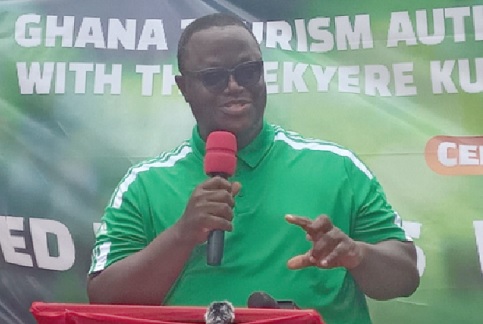 Frederick Adjei-Rudolph (left), Ashanti Regional Director, GTA, speaking at the event