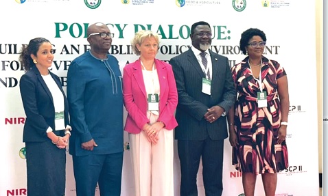 Paul Siameh (2nd from left), Chief Director, Ministry of Food and Agriculture, with Dr Andy Osei-Okrah (2nd from right), CEO, TCDA; Magdalena Wuest (middle), Deputy Head of Cooperation, Swiss Embassy; Ashwini Sebastian (left), World Bank, and Juliana Ofori-Karikari (right), Team Lead, GPSCP
