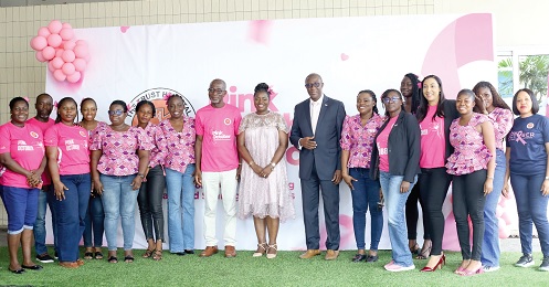 Janet Sunkwa-Mills (middle) with Dr Henry Shirazu Alhassan (6th from right), Supervising Director Dr Jumana Sfarjilani (3rd from right), Head of Medical, Dr Nana Ama Abankwa (5th from right), Chief of Medical Staff, all of The Trust Hospital, and other staff from the hospital during the launch.  Picture: BENEDICT OBUOBI