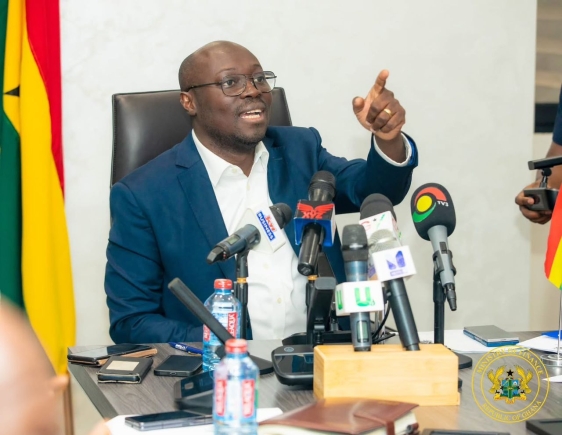 Dr Cassiel Ato Forson (right), Minister of Finance, addressing the Producer Price Committee on Cocoa