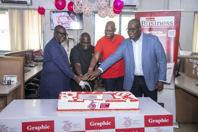 When Chief of Staff Julius Debrah cut the cake at Graphic@75