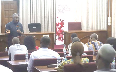 Sampson Lardy Ayenini, a private legal practitioner, and member, NAECAP team, addressing the participants in Kumasi. Picture: EMMANUEL BAAH
