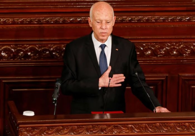 Tunisia's President Kais Saied gestures during his swearing-in ceremony for his second term at the parliament in Tunis, Tunisia October 21, 2024. REUTERS/Zoubeir Souissi Purchase Licensing Rights Tunisia's President Kais Saied gestures during his swearing-in ceremony for his second term at the parliament in Tunis, Tunisia October 21, 2024. REUTERS/Zoubeir Souissi Purchase Licensing Rights