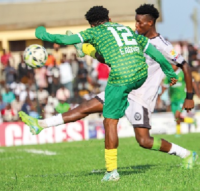 • Gold Stars' Emmanuel Agyei (left) battling with his All Blacks marker during their clash in Swedru • Gold Stars' Emmanuel Agyei (left) battling with his All Blacks marker during their clash in Swedru