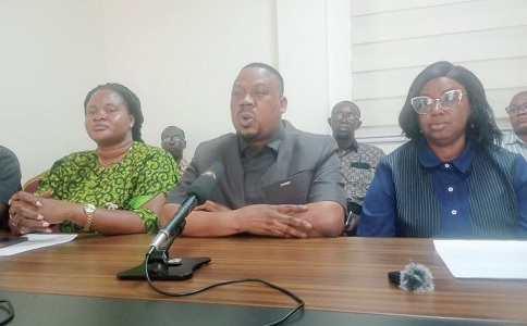King James Azortibah (middle), General Secretary of the Teachers and Educational Workers Union of the Trades Union Congress, addressing the media. With him are other executive members