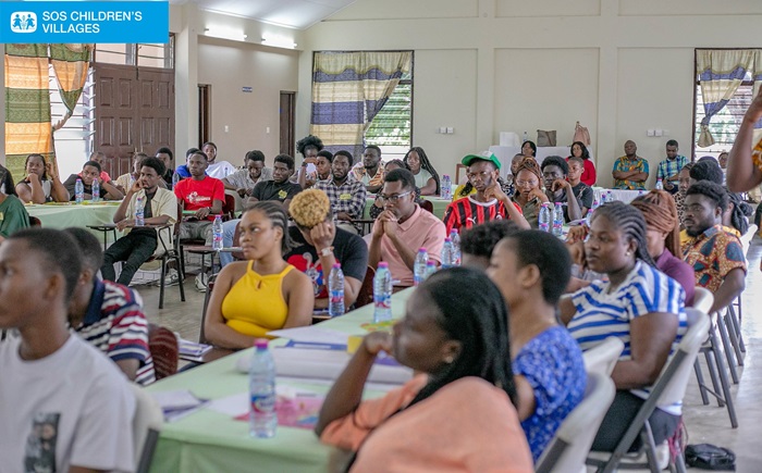 Participants at the workshop listening to a facilitator