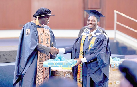 Isaac Aidoo (right) receiving his award