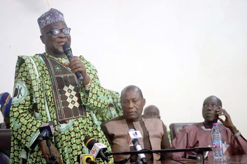 Alhaji Alhassan Bukari (left), National Chief Farmer, COCOSHE, addressing cocoa farmers in Kumasi. With him are Nana Kwasi Ofori (right), Central Regional Chief Farmer, and Johnson Mensah, Western South Regional Chief Farmer. Picture EMMANUEL BAAH