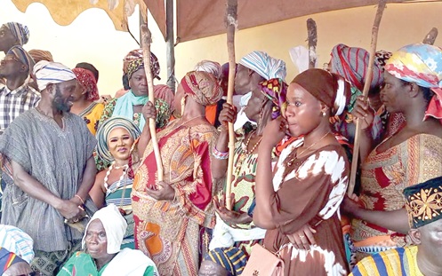 Women warriors holding the yodoya to protect Kpatu-Naa Nasike at the Damba celebration at the Gbewaa Palace