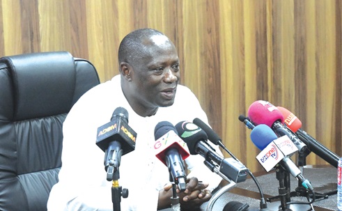 Emmanual Armah-Kofi Buah, Minister of Lands and Natural Resources, speaking to the media before the start of the press conference on activities of NAIMOS in Accra. Picture: SAMUEL TEI ADANO