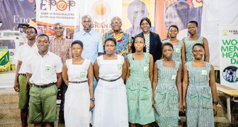 Back: Steven Yeboah (2nd from left), Senior Assistant Headmaster, Administration, Henry Teinor (3rd from left), Event Director, Ghana Energy Awards,  Kojo Aduhene  (4th from right), CEO of LMI Holdings, and Nana Akua Agyei (3rd from right), General Counsel at Petroleum Commission, with some of the students.