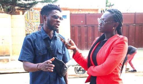Heneba Kwadwo Safo, Founder, Buzstopboys, being interviewed by our reporter. Picture: ELVIS NII NOI DOWUONA