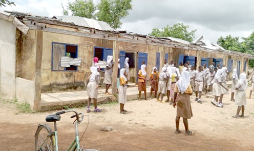 Pupils on break time during school hours in deplorable classrooms