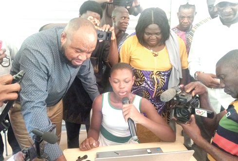 Mohammed Adams Sukparu, Deputy Minister of Communications, Digital Technology and Innovation, inspecting the work of the girls under training