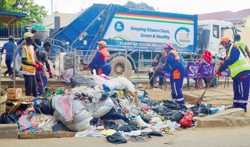 Some of the Zoomlion staff busily working during the clean-up exercise Some of the Zoomlion staff busily working during the clean-up exercise
