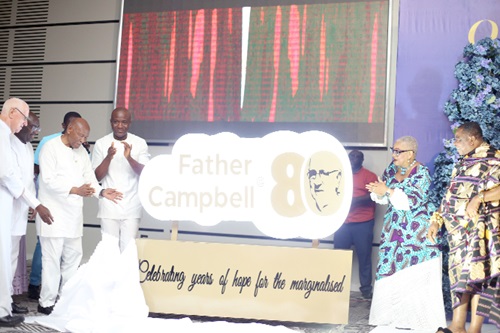 Sam Okudzeto (3rd from left) being assisted by Nana Appiagyei Dankawoso I (right), Chief, Asante Juaben Traditional Area, Dr Joyce Aryee (2nd from right), Rev. Father Andrew Campbell (left) and Dr Mahamudu Bawumia (2nd from left) to unveil the Father Andrew Campbell @ 80 logo. Picture: BENEDICT OBUOBI Sam Okudzeto (3rd from left) being assisted by Nana Appiagyei Dankawoso I (right), Chief, Asante Juaben Traditional Area, Dr Joyce Aryee (2nd from right), Rev. Father Andrew Campbell (left) and Dr Mahamudu Bawumia (2nd from left) to unveil the Father Andrew Campbell @ 80 logo. Picture: BENEDICT OBUOBI
