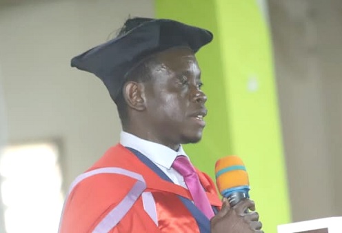 Prof. Eric Anane (inset), Director,  Institute of Education, University of Cape Coast, speaking at the event