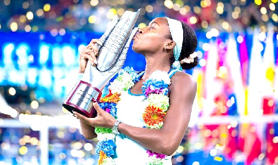 Coco Gauff celebrating with the WTA trophy Coco Gauff celebrating with the WTA trophy