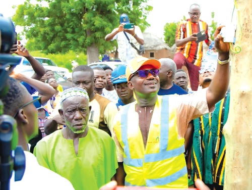 John Abdulai Jinapor, Minister of Energy and Green Transition, commissioning the electricity project at Nekpegu