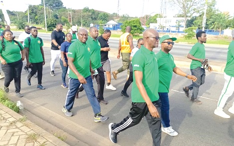 Akature Ania (arrowed), Director, HR and Administration, NPRA, leading the health walk Akature Ania (arrowed), Director, HR and Administration, NPRA, leading the health walk