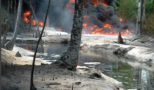 Oil from a leaking pipeline burns in Goi-Bodo, a swamp area of the Niger Delta, October 12, 2004. Reuters Oil from a leaking pipeline burns in Goi-Bodo, a swamp area of the Niger Delta, October 12, 2004. Reuters
