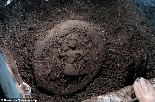 The ancient loaf of bread depicts Jesus as a farmer. Archaeologists said it was used in communion The ancient loaf of bread depicts Jesus as a farmer. Archaeologists said it was used in communion