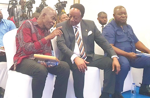 Professor Gabriel Nii Noi Dowuona (left), Department of Soil Science, UG, in a tête-à-tête with Dr Kwabena Duffour, a former Governor, Bank of Ghana. Looking on is Dr Said Boakye, acting Executive Director, Institute for Fiscal Studies. Picture: ERNEST KODZI 