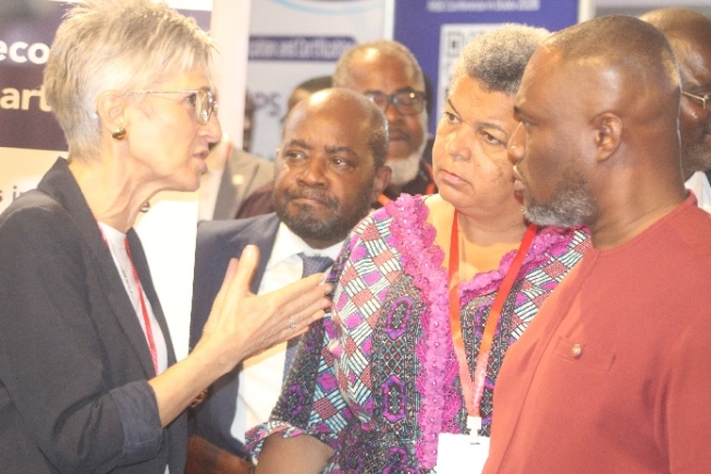 Jolanda Castagna (left), Managing Director of akka kappa Ltd., explains a point to Kenneth Gibert Adjei (right), Minister for Works, Housing, and Water Resources; Gizella Tetteh-Agbotui (2nd from right), Deputy Minister for Works, Housing, and Water Resources; and Emmanuel Jeffrey (3rd from right), Acting Chief Executive Officer of the Real Estate Agency Council (REAC) during the opening of the exhibition at the conference. Picture: ESTHER ADJORKOR ADJEI Jolanda Castagna (left), Managing Director of akka kappa Ltd., explains a point to Kenneth Gibert Adjei (right), Minister for Works, Housing, and Water Resources; Gizella Tetteh-Agbotui (2nd from right), Deputy Minister for Works, Housing, and Water Resources; and Emmanuel Jeffrey (3rd from right), Acting Chief Executive Officer of the Real Estate Agency Council (REAC) during the opening of the exhibition at the conference. Picture: ESTHER ADJORKOR ADJEI
