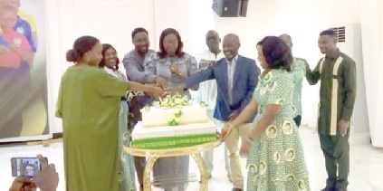 Dignitaries at the event cutting the anniversary cake