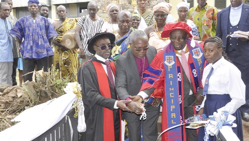 Rt Rev. Lt Col Bliss Divine Agbeko (retd) [2nd from left], Moderator of the General Assembly of EPCG, being assisted by Dr Dickson Tsey (2nd from right) and Professor Augustine Ocloo (left), acting Deputy Director-General of GTEC, to  inuagurate the residential block (inset)