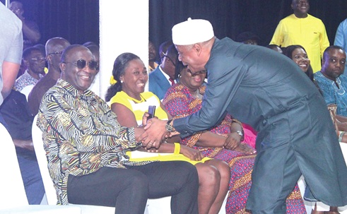Saddique Abubakar Boniface (right), Chairman, United Party, exchanging pleasantries with Alan John Kyerematen (seated), Founder, United Party. Looking on is the wife of Alan. Picture: ERNEST KODZI 